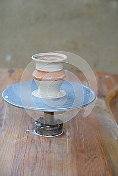 Fictile vase at the potterÃ¢â¬â¢s wheel